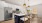 a kitchen with white cabinets