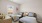 a couple of beds in a room