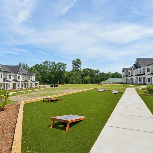 game lawn with corn hole